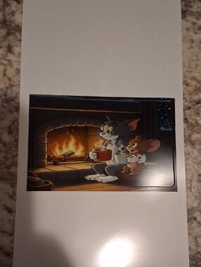 Tom & Jerry Fireplace Art Print - Cozy Winter Scene Debit Card Sticker